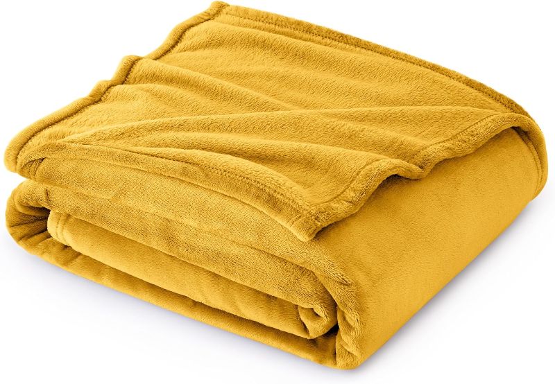 Photo 1 of Bedsure Mustard Yellow Fleece Blanket Throw Blanket - Gold Lightweight Blanket for Sofa, Couch, Bed, Camping, Travel - Super Soft Cozy Blanket
