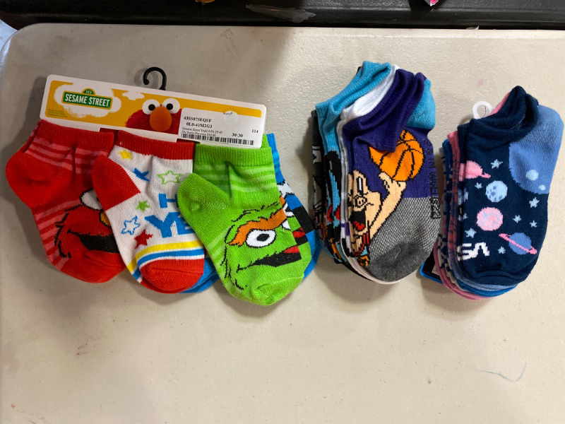 Photo 1 of 3 item bundle-socks various sizes. see photos