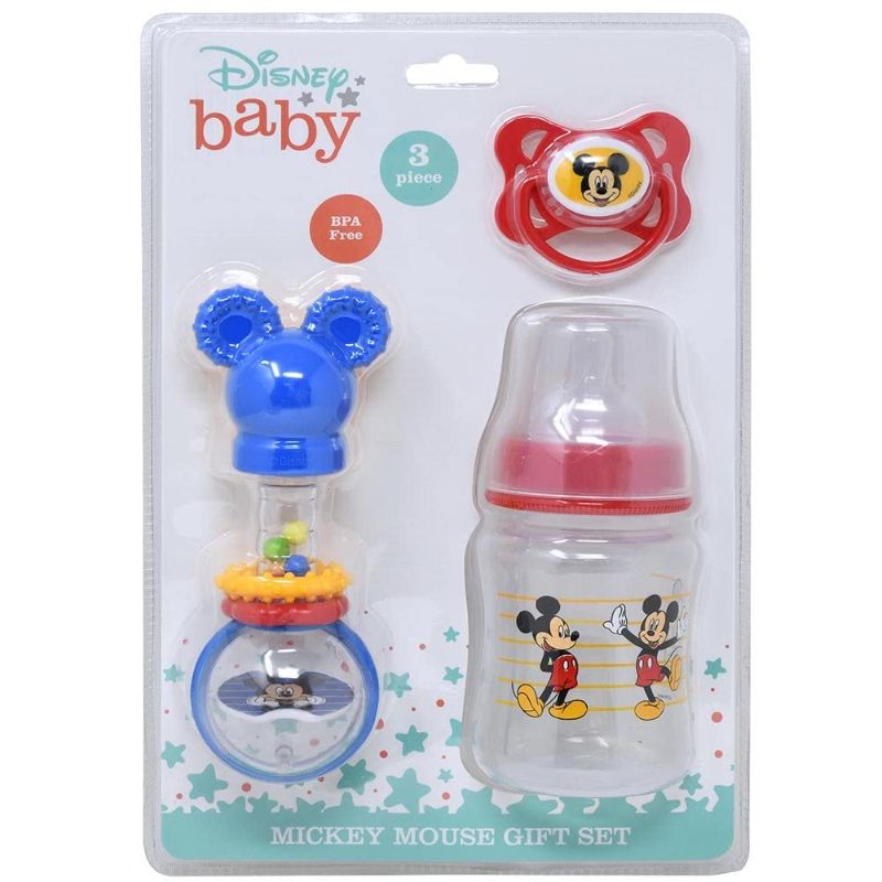 Photo 1 of minnie and mickey bottle, rattles, and pacifier