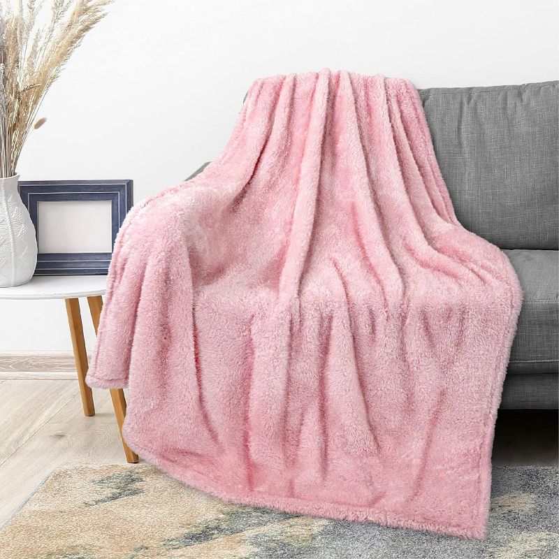 Photo 1 of PAVILIA Light Pink Plush Throw Blanket for Couch, Sherpa Soft Cozy Blanket and Throw for Sofa Bed, Decorative Fur Fuzzy Warm Fleece Blanket, Lightweight Boho Home Decor All Season, 50x60
