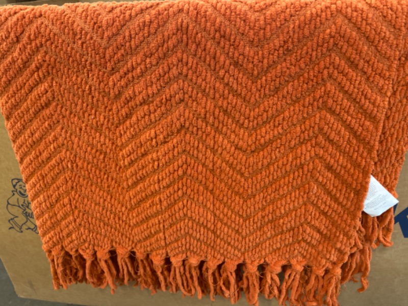 Photo 2 of Bedsure Burnt Orange Throw Blanket for Couch – Versatile Knit Woven Chenille Blanket for Chair, Super Soft, Warm & Decorative Blanket with Tassels for Bed, Sofa and Living Room (Burnt Orange, Throw)
