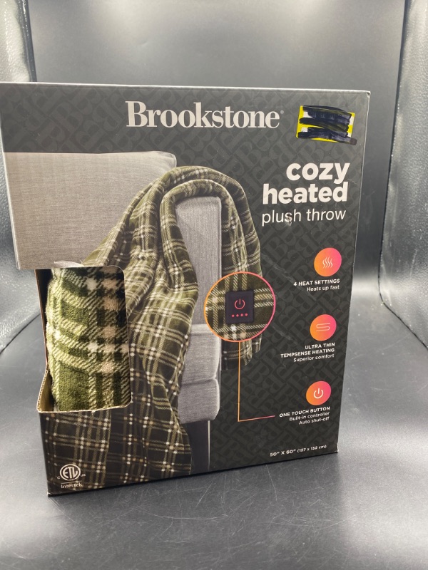 Photo 1 of Brookstone heated plush throw