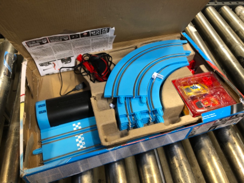 Photo 2 of Carrera First Disney/Pixar Cars - Slot Car Race Track - Includes 2 Cars: Lightning McQueen and Dinoco Cruz - Battery-Powered Beginner Racing Set for Kids Ages 3 Years and Up Disney Cars w/ Spinners