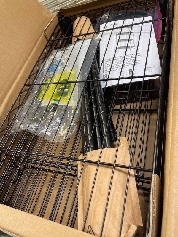 Photo 2 of Amazon Basics 4-Shelf Adjustable Storage Shelving Unit (200 lbs Loading Capacity per Shelf), Steel Organizer Wire Rack, Black (24" L x 14" W x 48" H) 4- Shelf Narrow No Wheels Black