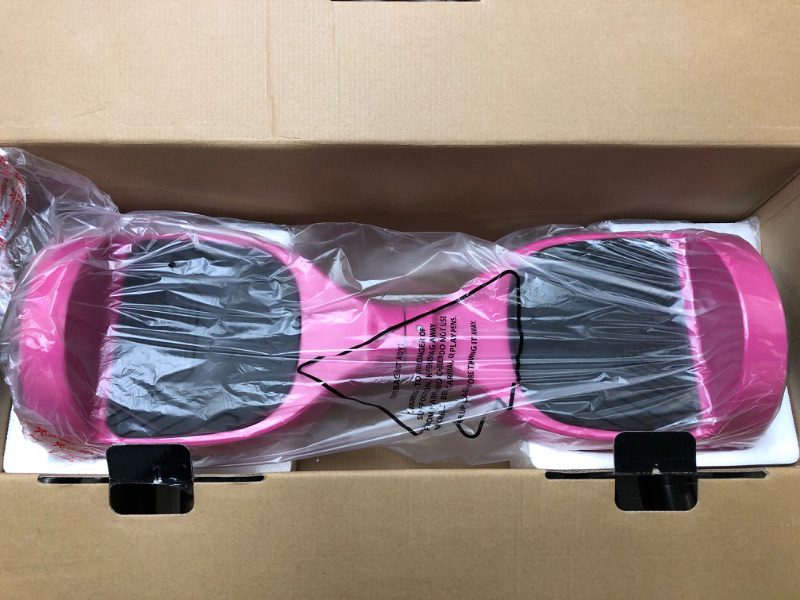 Photo 2 of Hover-1 Drive Electric Hoverboard | 7MPH Top Speed, 3 Mile Range, Long Lasting Lithium-Ion Battery, 6HR Full-Charge, Path Illuminating LED Lights Pink