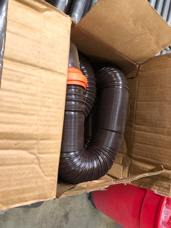 Photo 1 of Camco RhinoFLEX RV Sewer Hose Kit with Swivel Transparent Elbow and 4-in-1 Dump Station Fitting, Brown, 15 Feet (39770) 15ft Sewer Hose Kit Frustration-Free Packaging