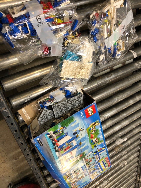 Photo 2 of LEGO City Police Training Academy 60372, Station Playset with Obstacle Course, Horse Figure, Quad Bike Toy and 6 Officer Minifigures, for Kids Ages 6 Plus Standard Packaging