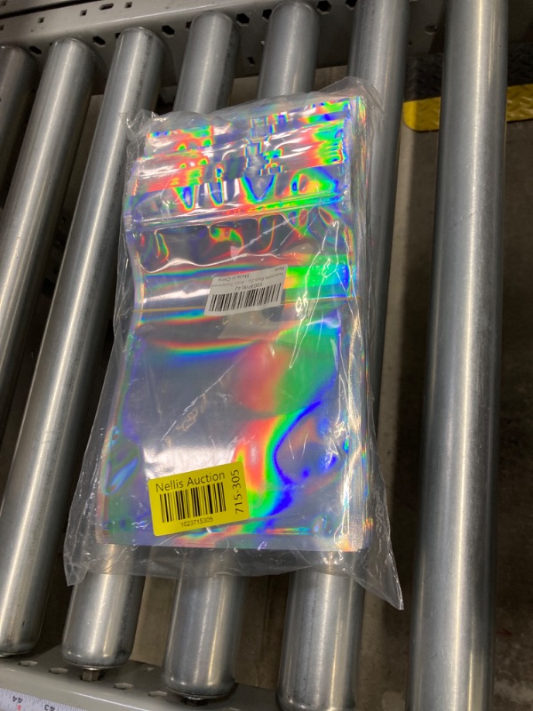 Photo 2 of 100PCS Smell Proof Mylar Bags Holographic Packaging Pouch Bag with Clear Window,6.3x9.4inch Resealable Ziplock Foil Pouch Bags for Food Storage, Candy, Jewelry, Electronics Storage (Transparent) 6.3x9.4inch Transparent