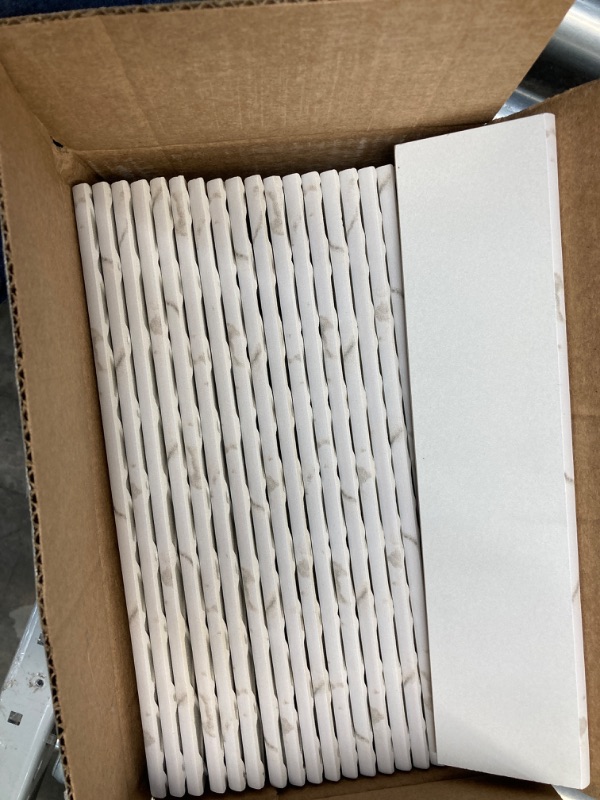 Photo 2 of ***SEVERAL TILES BROKEN*** Michelangelo Calacatta Bullnose 3 in. x 12 in. Matte Porcelain Floor and Wall Tile Trim (20 linear feet/Case)