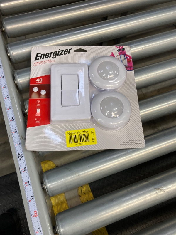Photo 1 of Energizer LED Puck Lights, Wall Switch Remote, 2 Pack, Battery Operated, Under Cabinet Lighting, Wireless Lights, 50 ft Range, Perfect for Kitchen Under Cabinet, Laundry Room, and More, 58822-T1 2 Pack White - Wall Switch