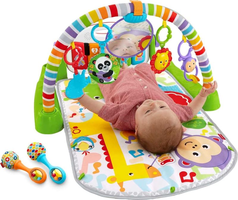 Photo 1 of Fisher-Price Baby Playmat Deluxe Kick & Play Piano Gym & Maracas with Smart Stages Learning Content, 5 Linkable Toys & 2 Soft Rattles