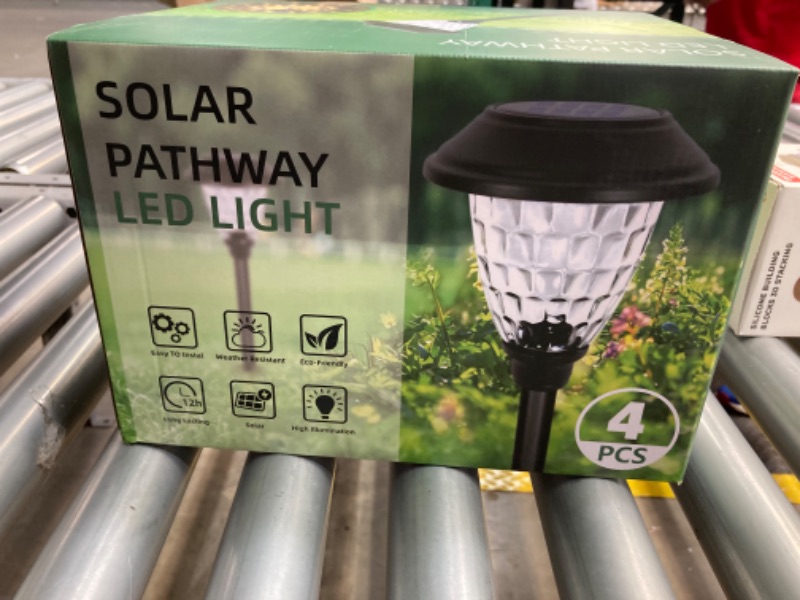 Photo 1 of Solar Lights Outdoor Waterproof,Solar Pathway Lights,Supper Bright UP to 12 Hrs Stainless Steel Solar Garden Lights,Landscape Lighting for Yard Patio Walkway Driveway Pathway (4Pack/Warm Light)