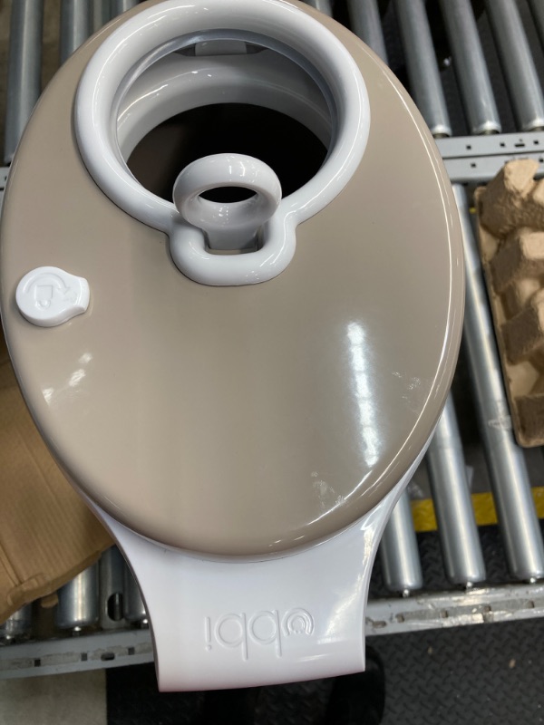 Photo 3 of ***side has dents ***Ubbi Steel Odor Locking, No Special Bag Required Money Saving, Awards-Winning, Modern Design Registry Must-Have Diaper Pail, Taupe