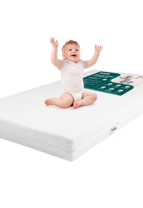 Photo 1 of BABELIO Breathable Crib Mattress, Dual-Sided Memory Foam Toddler Mattress, Waterproof Baby Mattresses for Crib and Toddler Bed, Removable and Machine Washable Mattress Cover, 52" x 27"