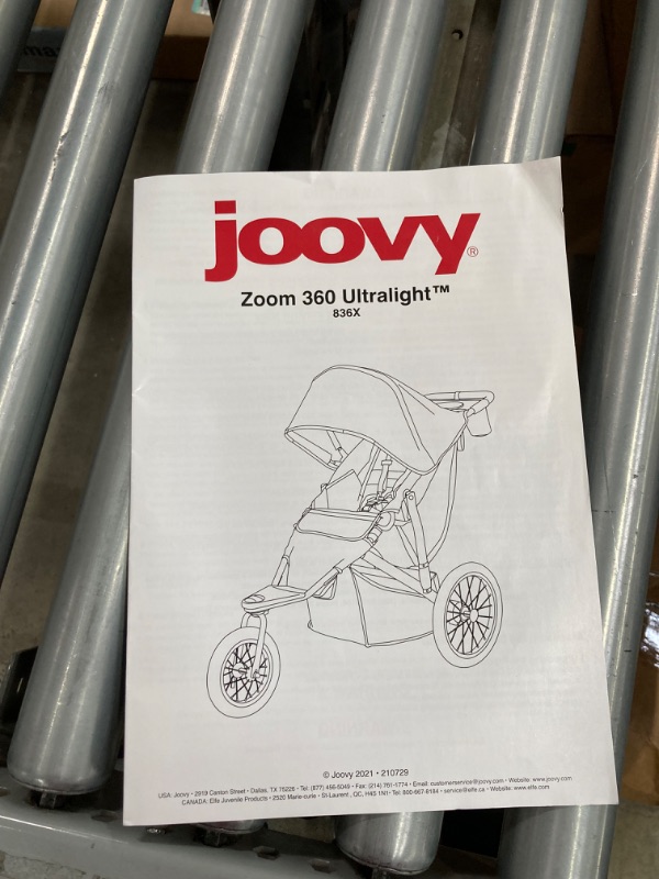 Photo 3 of Joovy Zoom360 Ultralight Jogging Stroller Featuring High Child Seat, Shock-Absorbing Suspension, Extra-Large Air-Filled Tires, Parent Organizer, Air Pump, and Easy One-Hand Fold (Blueberry)