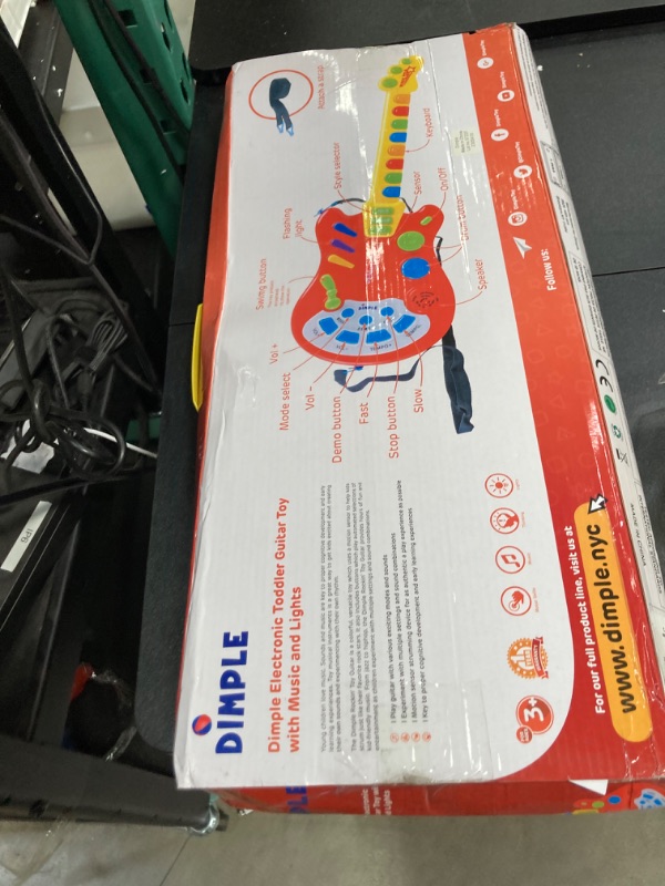 Photo 2 of Dimple Kids Handheld Musical Electronic Toy Guitar with Over 20 Interactive Buttons, Levers and Modes for Children, Best Toy & Gift for Girls & Boys (Guitar with Batteries)