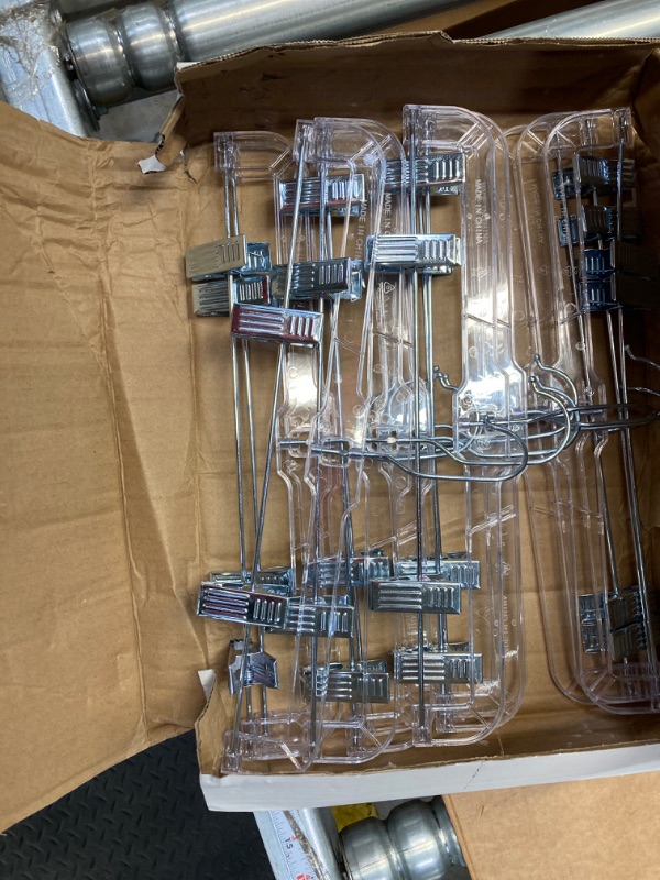 Photo 1 of HOUSE DAY 12 Pack 14 inch Clear Plastic Skirt Hangers with Adjustable Clips, Pants Hangers 360-Rotating Swivel Hook, Clip Hangers for Pants, Trousers, Skirts, Jeans, Bulk Plastic Hangers with Clips 12Pack