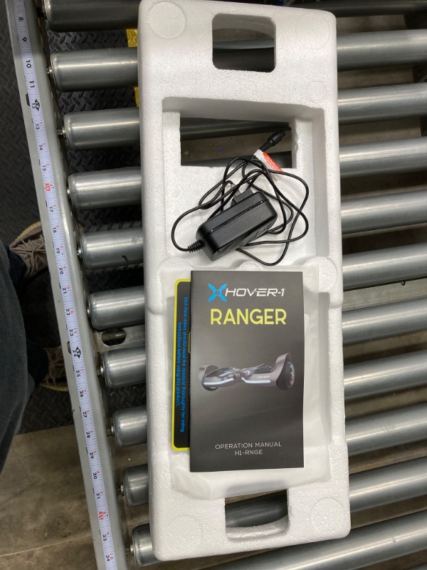 Photo 1 of Hover-1 Ranger Electric Self-Balancing Hoverboard with Dual 200W Motors, 7 MPH Max Speed, 6 Miles Max Range, and 6.5” Tires