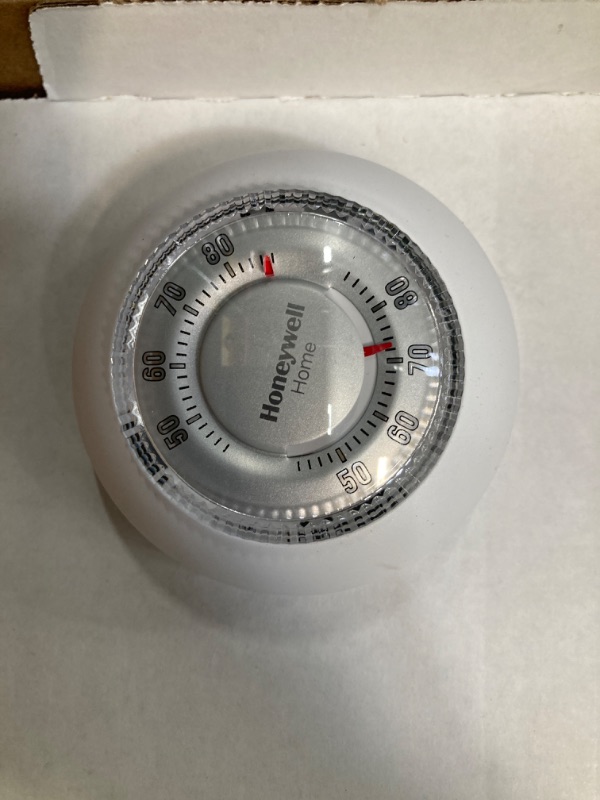 Photo 2 of Honeywell YCT87K1003 Round Heat Only Manual Thermostat