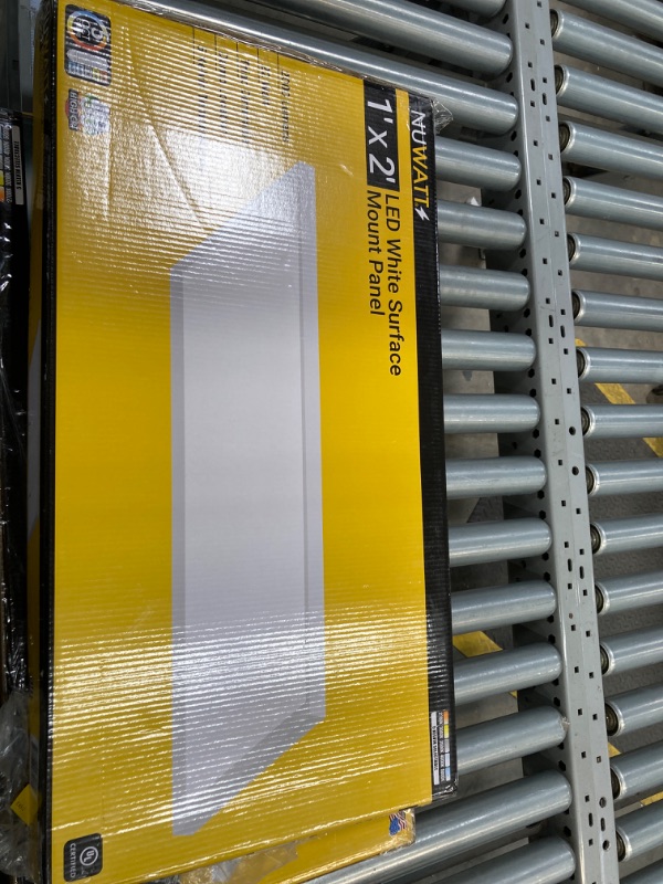 Photo 1 of NUWATT 1x2 LED Surface Mount Panel 22W - Internal Driver, 5 CCT Selectable 2700K, 3000K, 3500k, 4000K, 5000K, Triac Dimmable, Ultra Thin Ceiling Fixture, 120V, 1 inch Thick 5 Kelvin Selectable 1x2 FT