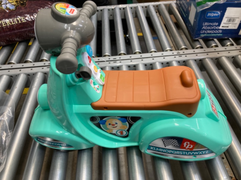 Photo 5 of Fisher-Price Laugh & Learn Toddler Ride-On Toy, Smart Stages Cruise Along Scooter with Lights Music and Learning for Ages 1 Year and Up