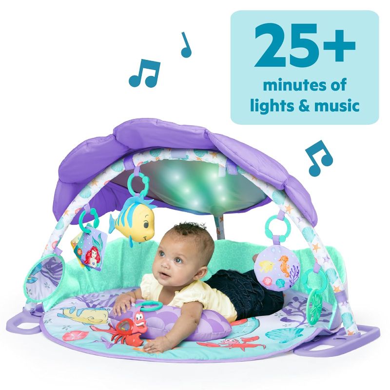 Photo 1 of Bright Starts Disney Baby The Little Mermaid Twinkle Trove Light-Up Musical Baby Activity Gym with Tummy Time Pillow, Newborn+