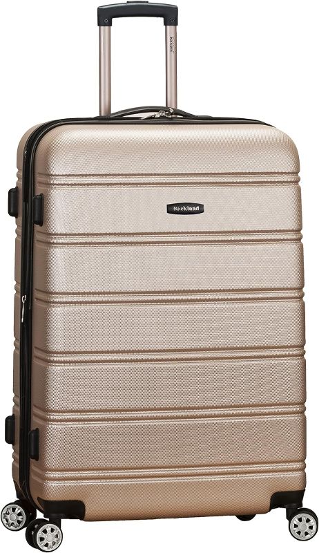 Photo 1 of Rockland Melbourne Hardside Expandable Spinner Wheel Luggage, Brown, Carry-On 20-Inch
