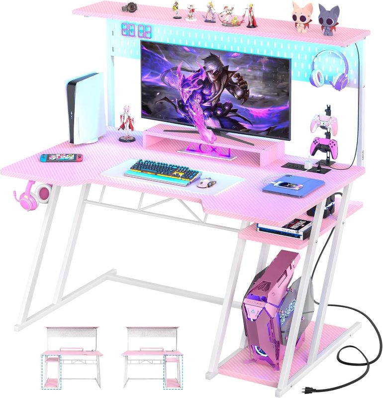 Photo 1 of Gaming Computer Desk with Storage Shelves & Z-Shaped Legs, Pink Gaming Desk with Hutch and LED Lights, Reversible PC Gaming Desk with Pegboard for Bedroom & Small Spaces, Carbon Fiber