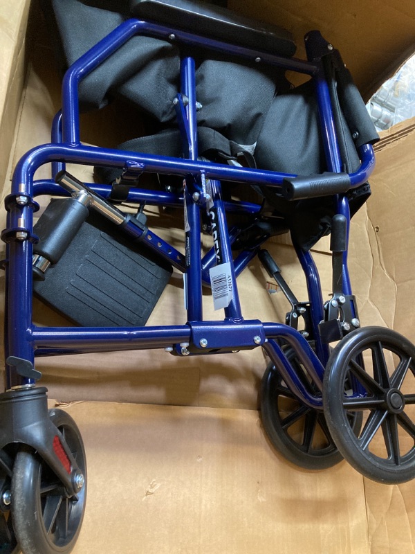 Photo 2 of Carex Transport Wheelchair With 19 inch Seat - Folding Transport Chair with Foot Rests - Foldable Wheel Chair for Travel and Storage, 1 Count