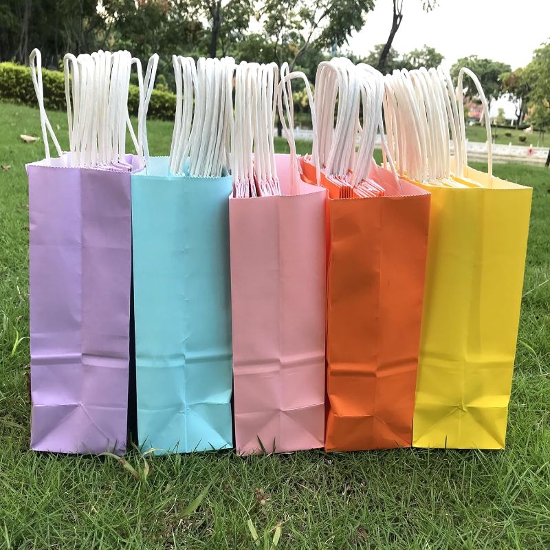 Photo 1 of 
TripDock 50 Pack Mixed-Colored Small Size Kraft Paper Bags with Handles for Wrapping Gifts and Goodies-8.26x5.9x3.15 Small Size Gift Bags