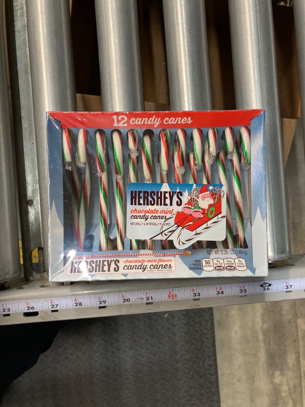 Photo 1 of **1 PACK OF 12** Hershey's Chocolate Mint Flavored Candy Cane Individually Wrapped, Holiday Colors, Red, Green and White