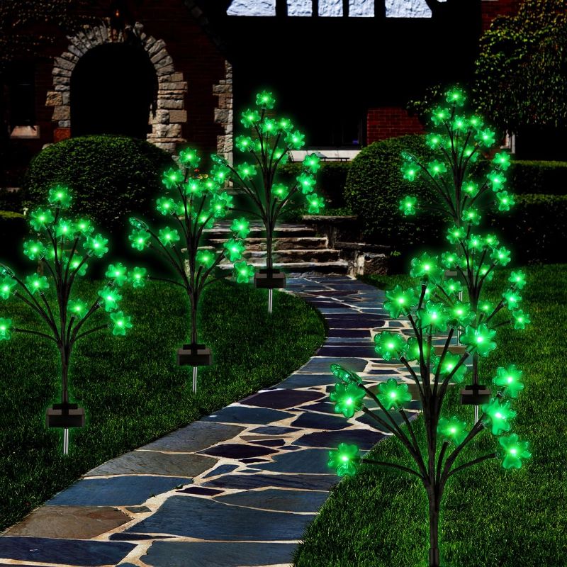 Photo 1 of 6 Pcs St. Patrick's Day Light Decor 96 LED Solar Shamrock Stake Light 27.5 Inch Outdoor Waterproof Lucky Green Stake Light for Outdoor Yard Garden Lawn Pathway Irish Day Decoration