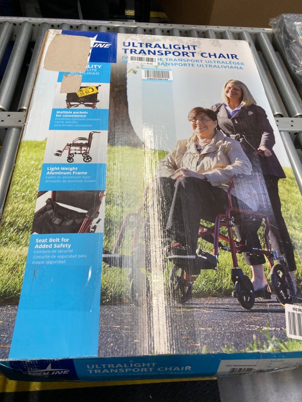 Photo 4 of Medline Ultralight Transport Wheelchair with 19” Wide Seat, Folding Transport Chair with Permanent Desk-Length Arms, Red Frame