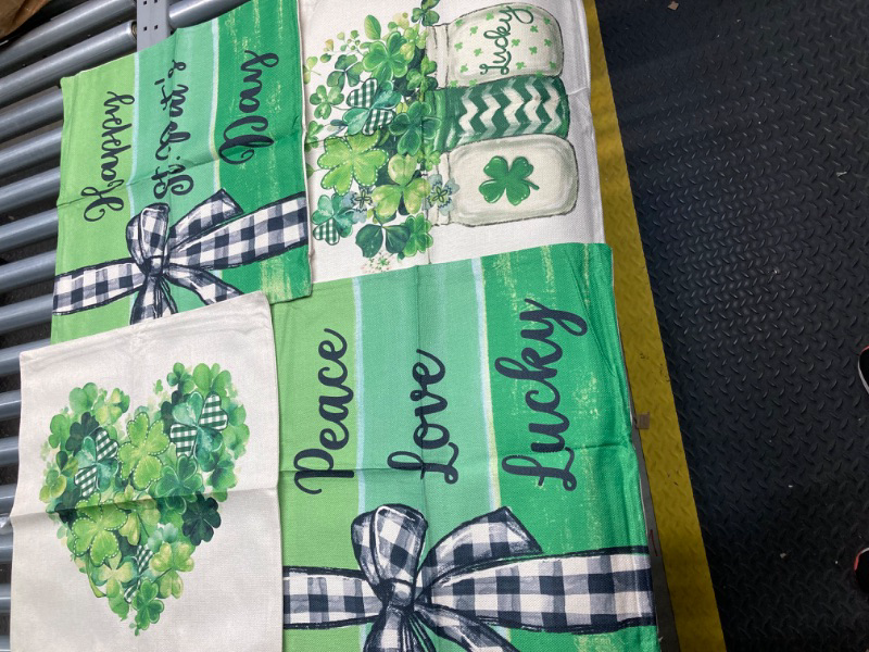 Photo 1 of AVOIN colorlife Happy ST Patricks Day Peace Love Lucky Throw Pillow Covers, 20 x 20 Inch Clover Stripes Decoration for Sofa Couch Set of 4 20" x 20"