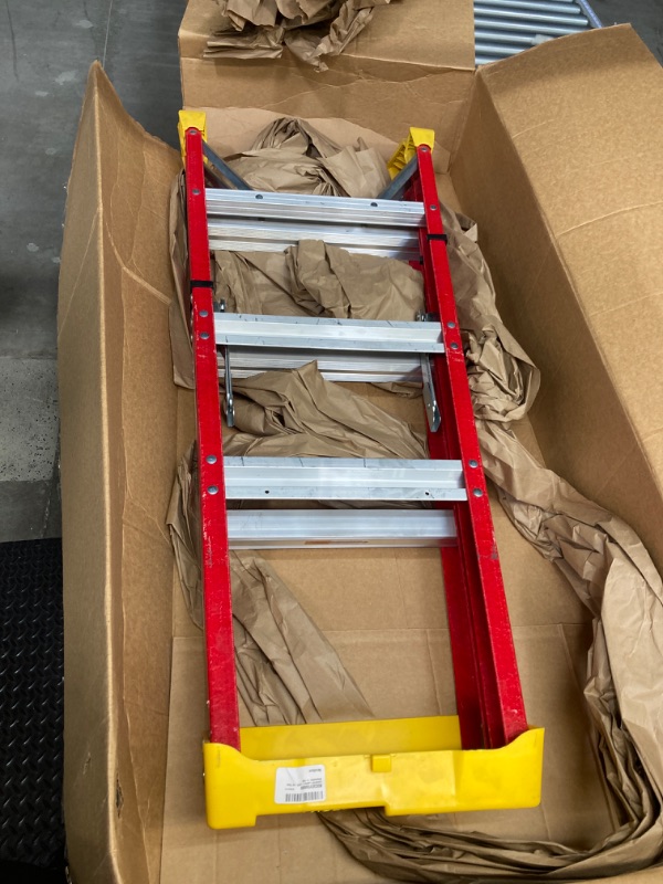 Photo 2 of ** DAMAGED ** Louisville Ladder L-3016-04 Step Stepladder, 4-Feet 4 feet - Damaged, cracked fiberglass leg, bent supports on leg