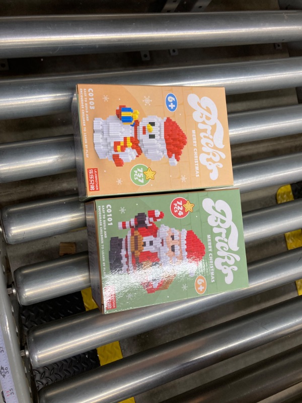 Photo 1 of Christmas Building Blocks Set - 1481Pcs New Santa Claus & Snowman Playset Christmas Stocking Stuffers for Kids Teens Boys Girls