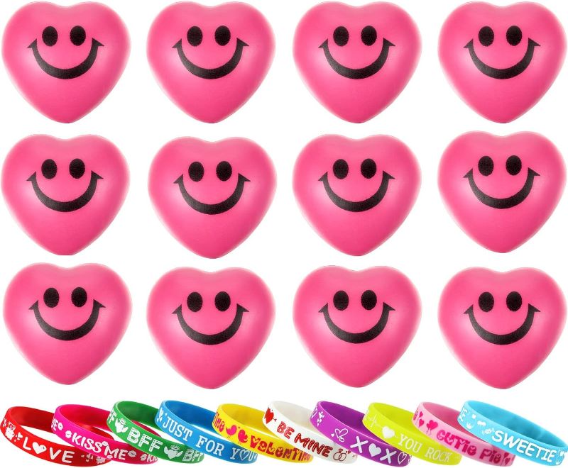 Photo 1 of 32 Pieces Valentine's Day Heart Smile Face Stress Balls Funny and Silicone Bracelets Stress Relief Smile Ball for Classroom Exchange Party Favor Game Prize Carnival Valentine Present (Pink)