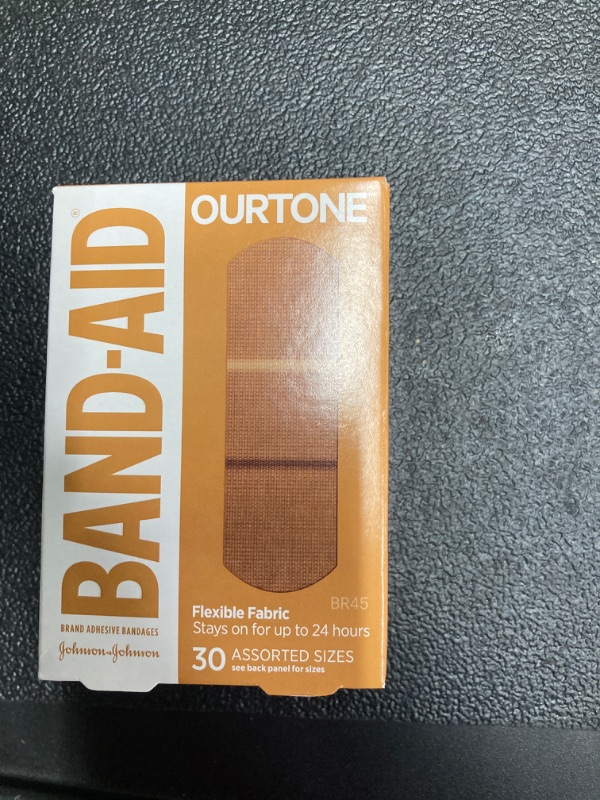 Photo 2 of Band-Aid Brand Ourtone Flexible Fabric Adhesive Bandages Flexible Protection Care of Minor Cuts Scrapes QuiltAid Pad for Painful Wounds Assorted Sizes, Br45, 30 Count Br45 30 Piece Assortment