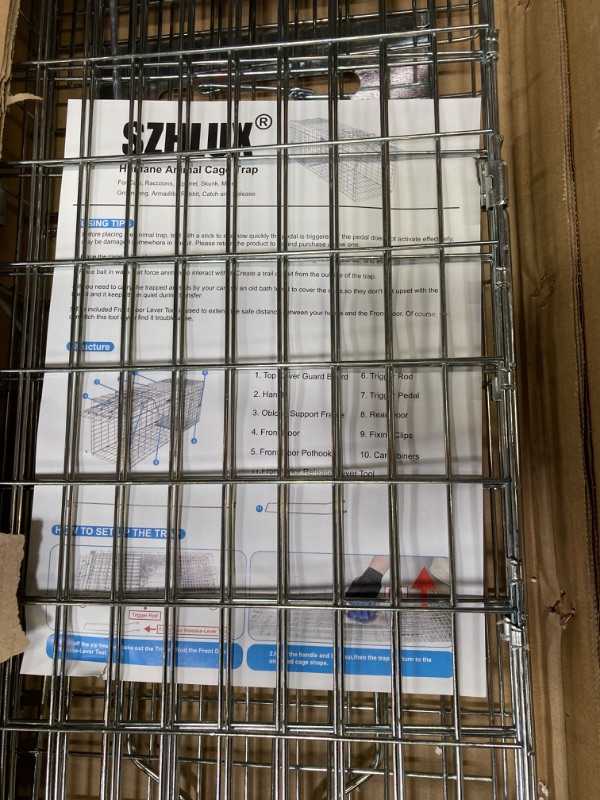 Photo 3 of SZHLUX 32" Live Animal Cage Trap, Heavy Duty Folding Raccoon Traps, Humane Cat Trap for Stray Cats, Raccoons, Squirrel, Skunk, Mole, Groundhog, Armadillo, Rabbit, Catch and Release(SZ-HXL8130-NEW).