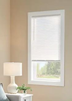 Photo 1 of 2  Boxes- Pre-Cut 27 in. W x 64 in. L Cordless Light Filtering White Vinyl Mini Blind with 1 in. Slats