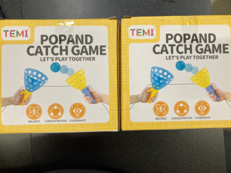 Photo 3 of 2 Pack TEMI Pop Pass Catch Ball Game with 4 Catch Launcher Baskets and 20 Balls, Beach Toys Backyard Outdoor Indoor Game Age 3 4 5 6 7 8 9 10+ Years Old Boys Girls Kids Adults Family Christmas Easter Gifts