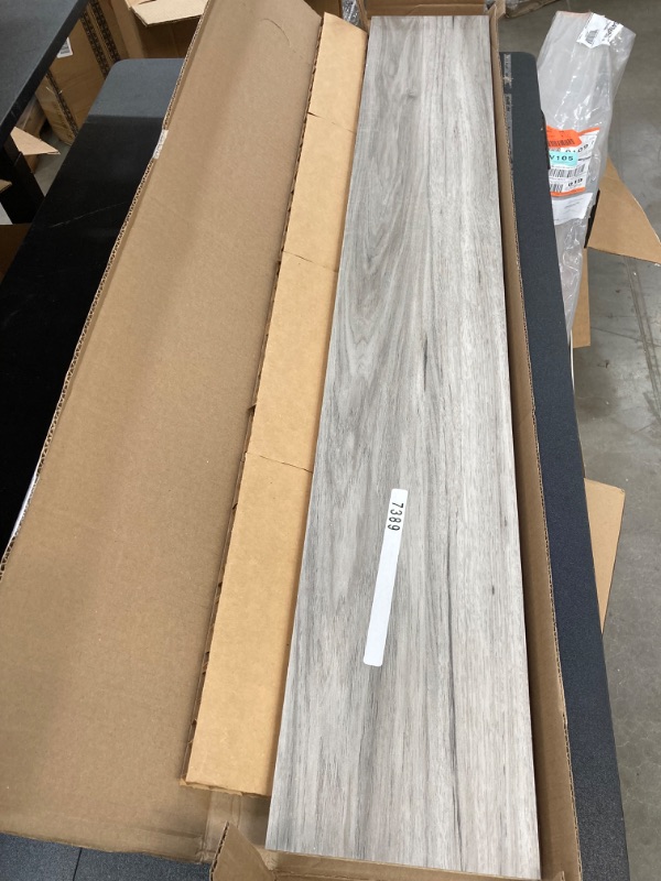 Photo 1 of Banff Gray Hickory 47 in. L x 7.37 in. W x 0.56 in. T Vinyl Stair Reversible Riser
