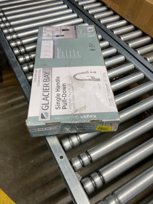 Photo 1 of Single-Handle Pull-Down Sprayer Kitchen Faucet with soap Dispenser in Stainless Steel