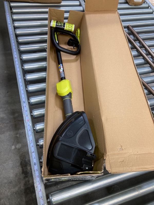 Photo 2 of ***(TOOL-ONLY NO BATTERY AND THE FRONT ATTACHMENT )***
RYOBI 40-Volt Lithium-Ion Cordless Attachment Capable String Trimmer with 4.0 Ah Battery and Charger Included (Open Box)