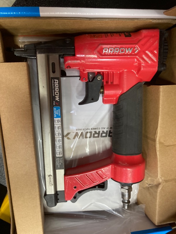 Photo 2 of ***HEAVILY USED*** Arrow PT50 Oil-Free Pneumatic Staple Gun, Professional Heavy-Duty Stapler for Wood, Upholstery, Carpet, Wire Fencing, Fits 1/4”, 5/16”, 3/8", 1/2", 9/16” Staples , Red 1 Unit