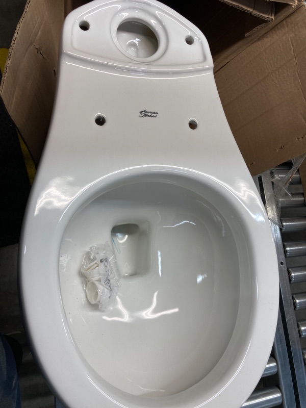 Photo 3 of H2Option 2-piece 0.92/1.28 GPF Dual Flush Round Front Toilet with Liner in White, Seat Not Included
