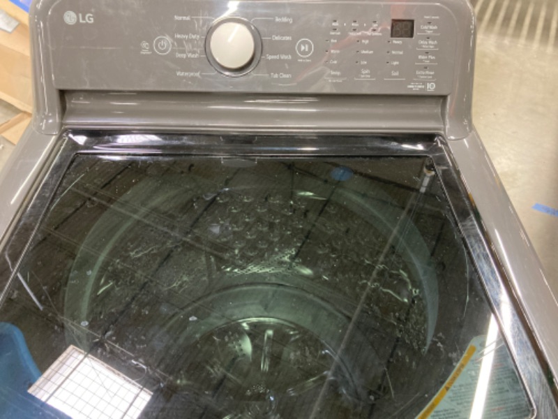 Photo 3 of LG - 4.1 Cu. Ft. High-Efficiency Top Load Washer with TurboDrum Technology - Monochrome Grey