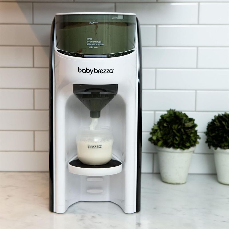 Photo 1 of Baby Brezza New and Improved Formula Pro Advanced Formula Dispenser Machine - Automatically Mix a Warm Formula Bottle Instantly - Easily Make Bottle with Automatic Powder Blending, White