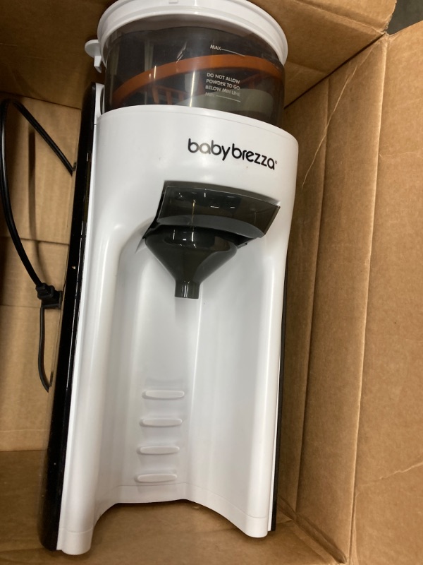 Photo 2 of ***LID IS WARPED AND CANNOT BE USED*** Baby Brezza New and Improved Formula Pro Advanced Formula Dispenser Machine - Automatically Mix a Warm Formula Bottle Instantly - Easily Make Bottle with Automatic Powder Blending, White