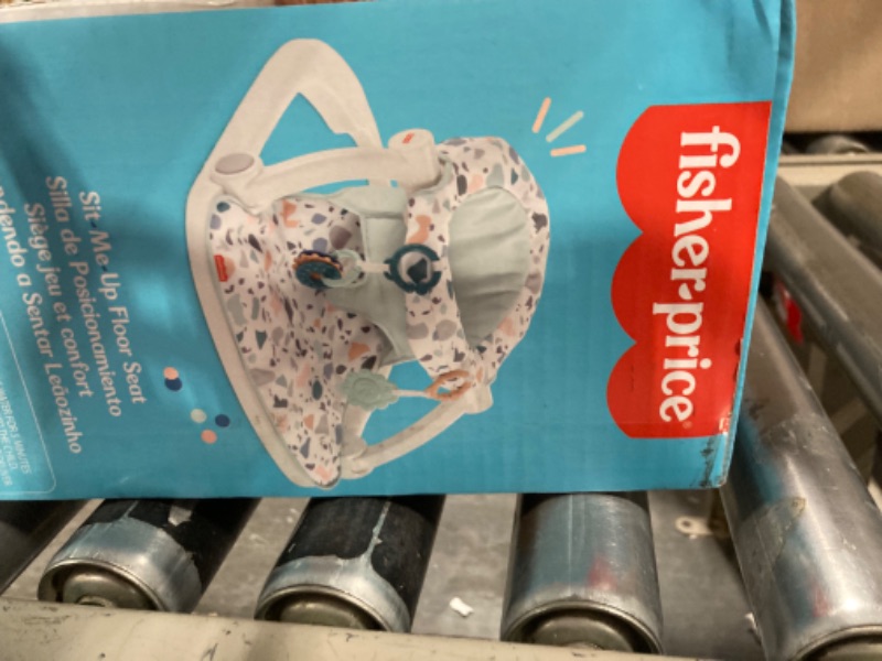 Photo 1 of fisher baby chair with fidgets 